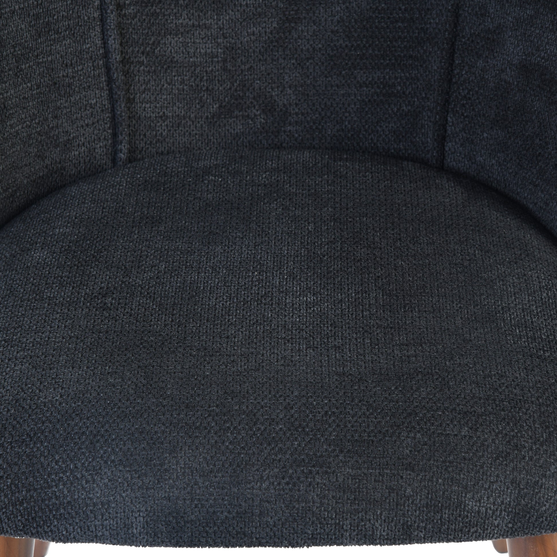 Kali gray upholstered dining chair showing charcoal fabric seat detail