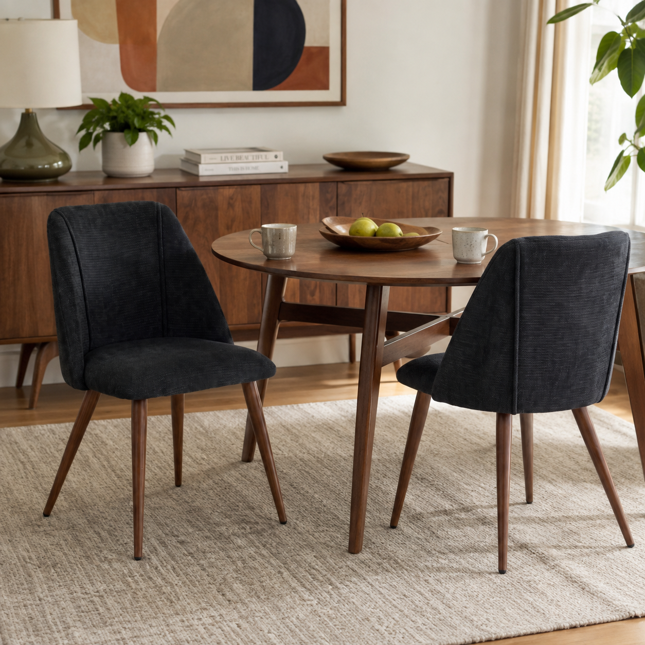 Kali gray upholstered dining chairs with walnut-tone tapered metal legs set of 2 in a bright dining area