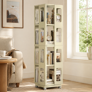 Kernel yellow rotating bookshelf showing four-tier book storage beside a window in a bright living room