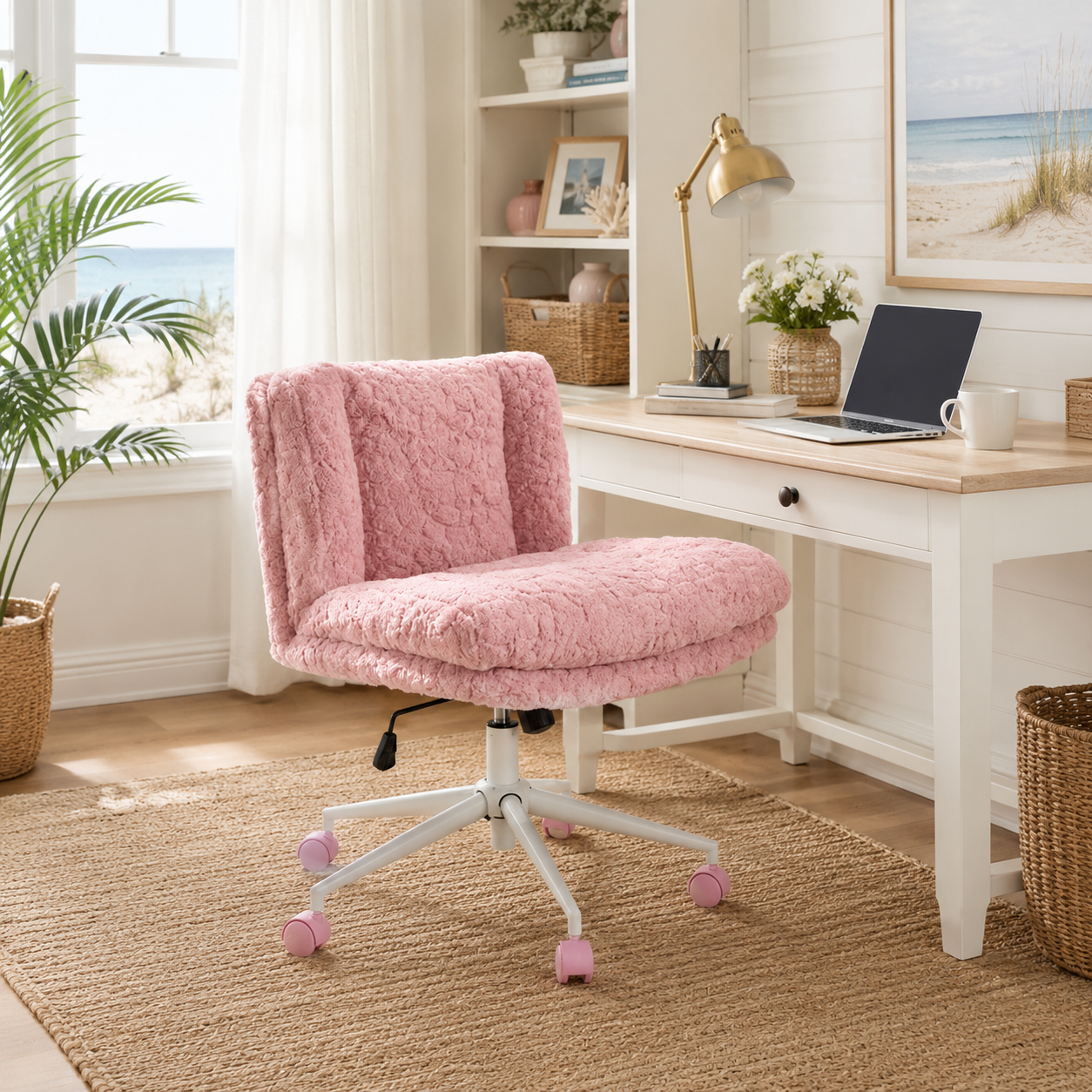 Kinna pink faux fur office chair beside a desk in a cozy workspace