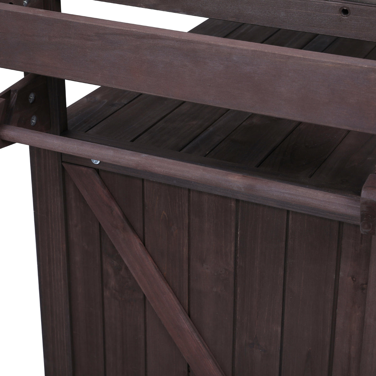 Close-up of the side storage rack on the black Limoges outdoor kitchen island showing slatted wood shelf design for towels bottles and grilling accessories storage outdoors