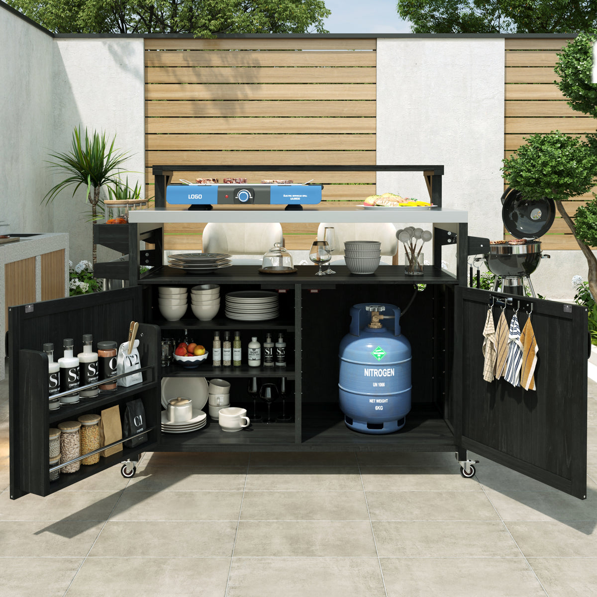 Black Limoges rolling outdoor kitchen island with stainless steel prep top open cabinet storage spice rack towel hooks and propane tank compartment for backyard grilling and patio entertaining