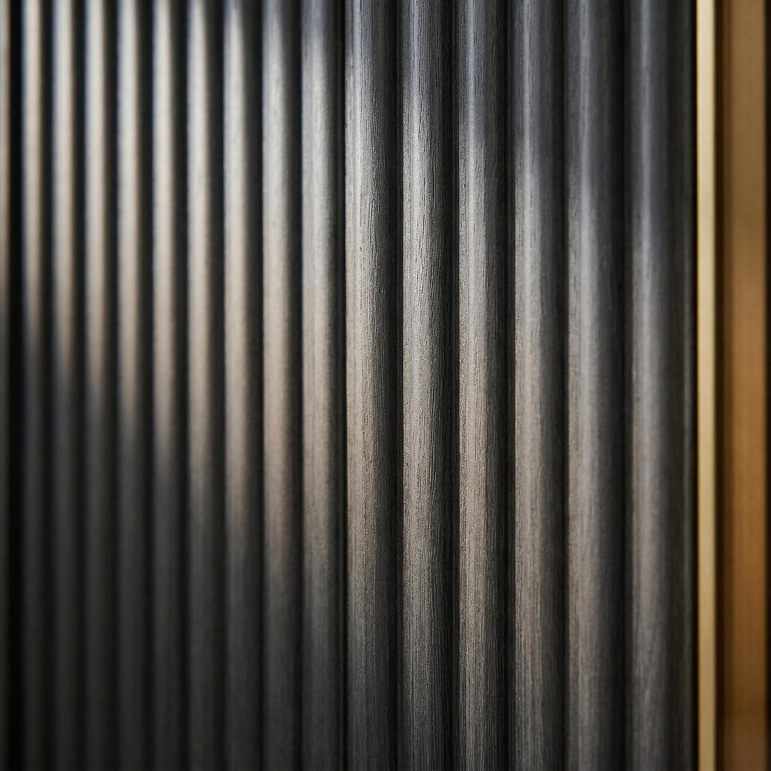 Lund black TV stand showing fluted door panel detail