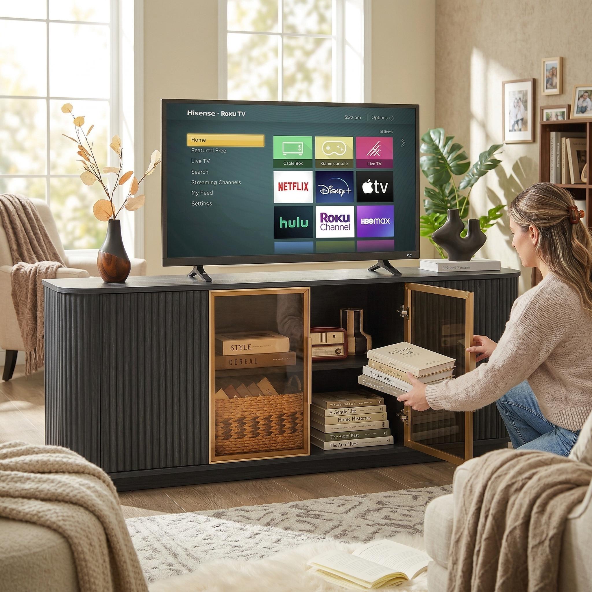 Lund black tv stand showing a television and open media storage in a living room