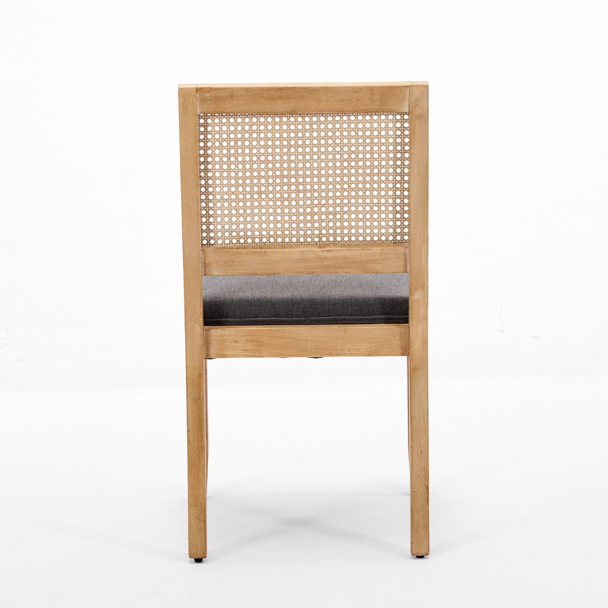 Maggiore gray dining chair rear view with woven rattan backrest on white background
