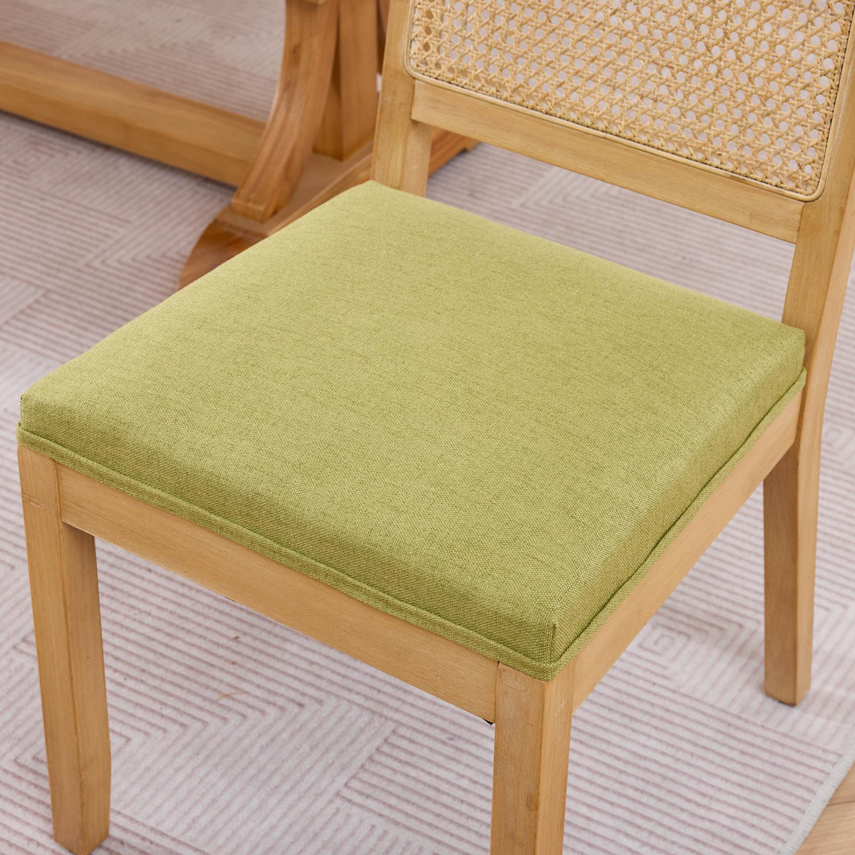 Maggiore green dining chair close-up of the green upholstered seat cushion