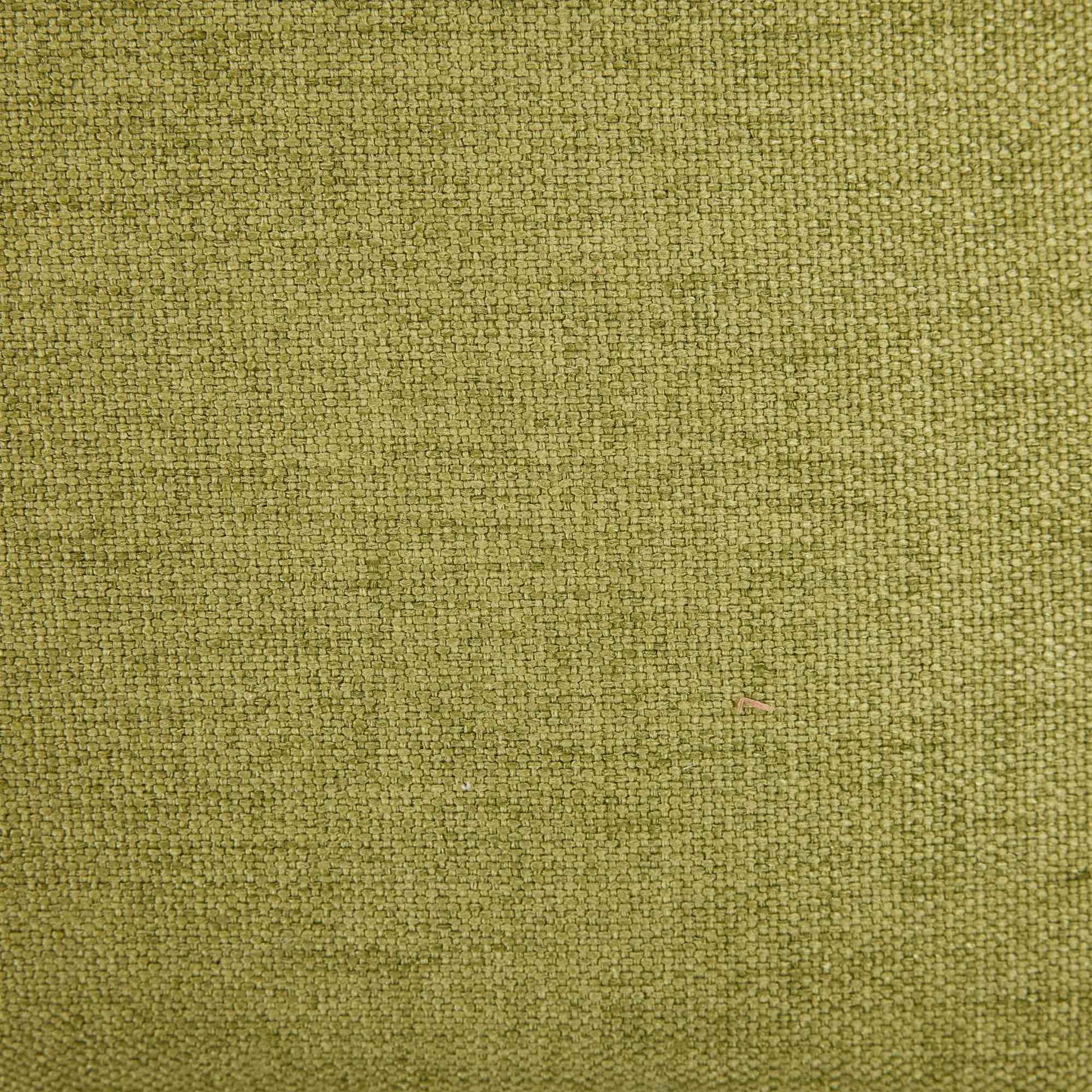 Maggiore green dining chair close-up of the green upholstery fabric texture