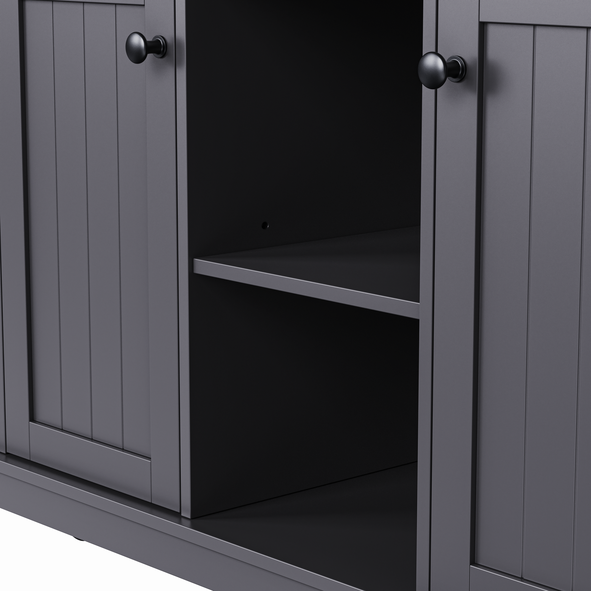Close-up of Maui black rolling kitchen island featuring adjustable open storage shelf with farmhouse cabinet doors and black round knobs