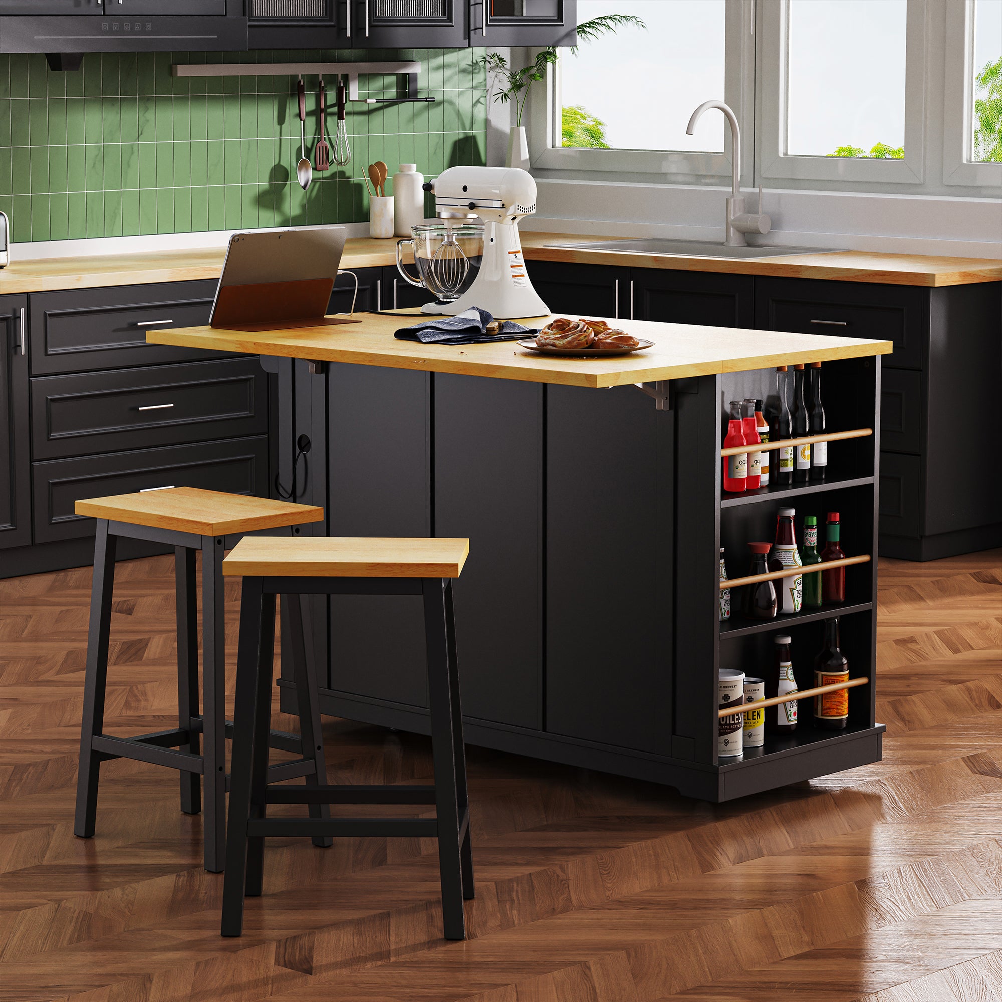 Rear angle view of Maui black rolling kitchen island with expanded drop leaf countertop open side storage shelves and matching bar stools in modern kitchen scene
