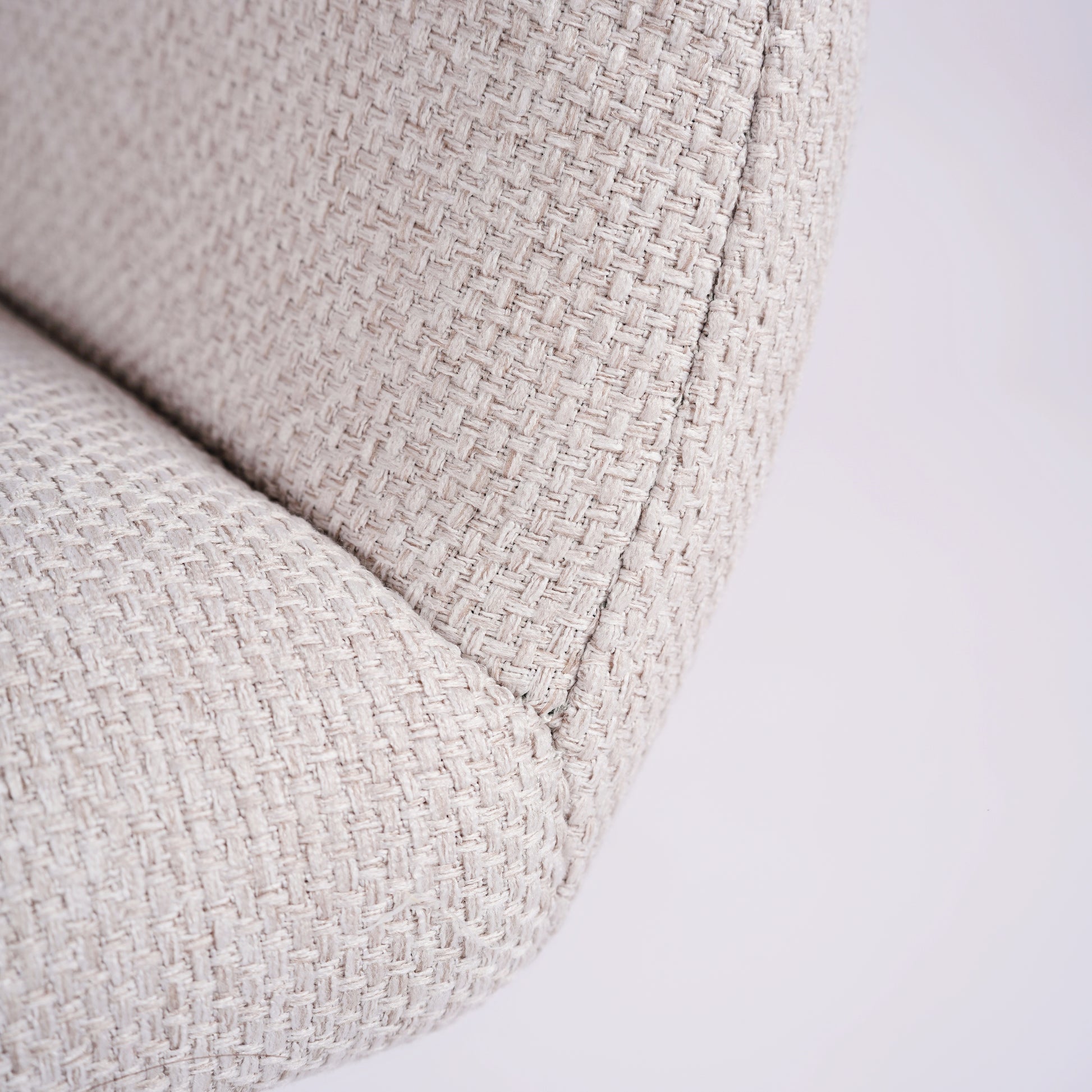 Mayfair beige fabric dining chair showing woven upholstery texture detail