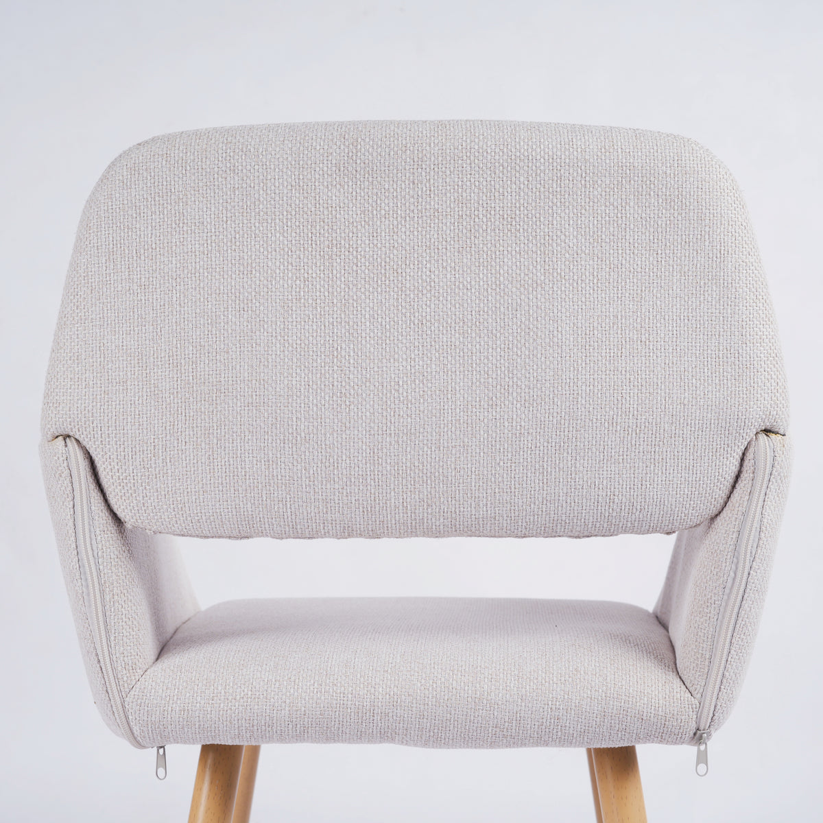 Mayfair beige fabric dining chair showing woven upholstery texture detail