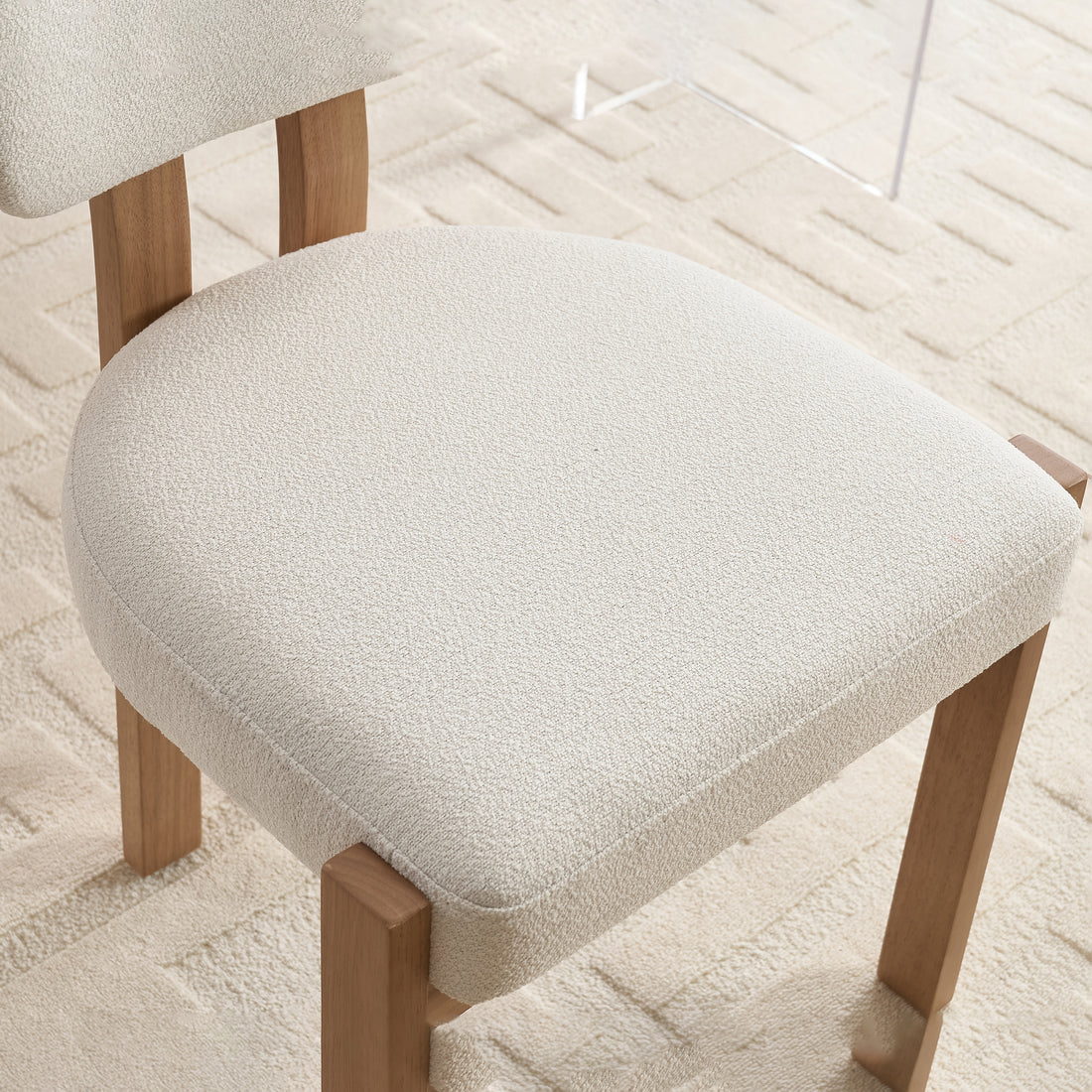 Michigan white upholstered dining chair close-up of the padded seat cushion