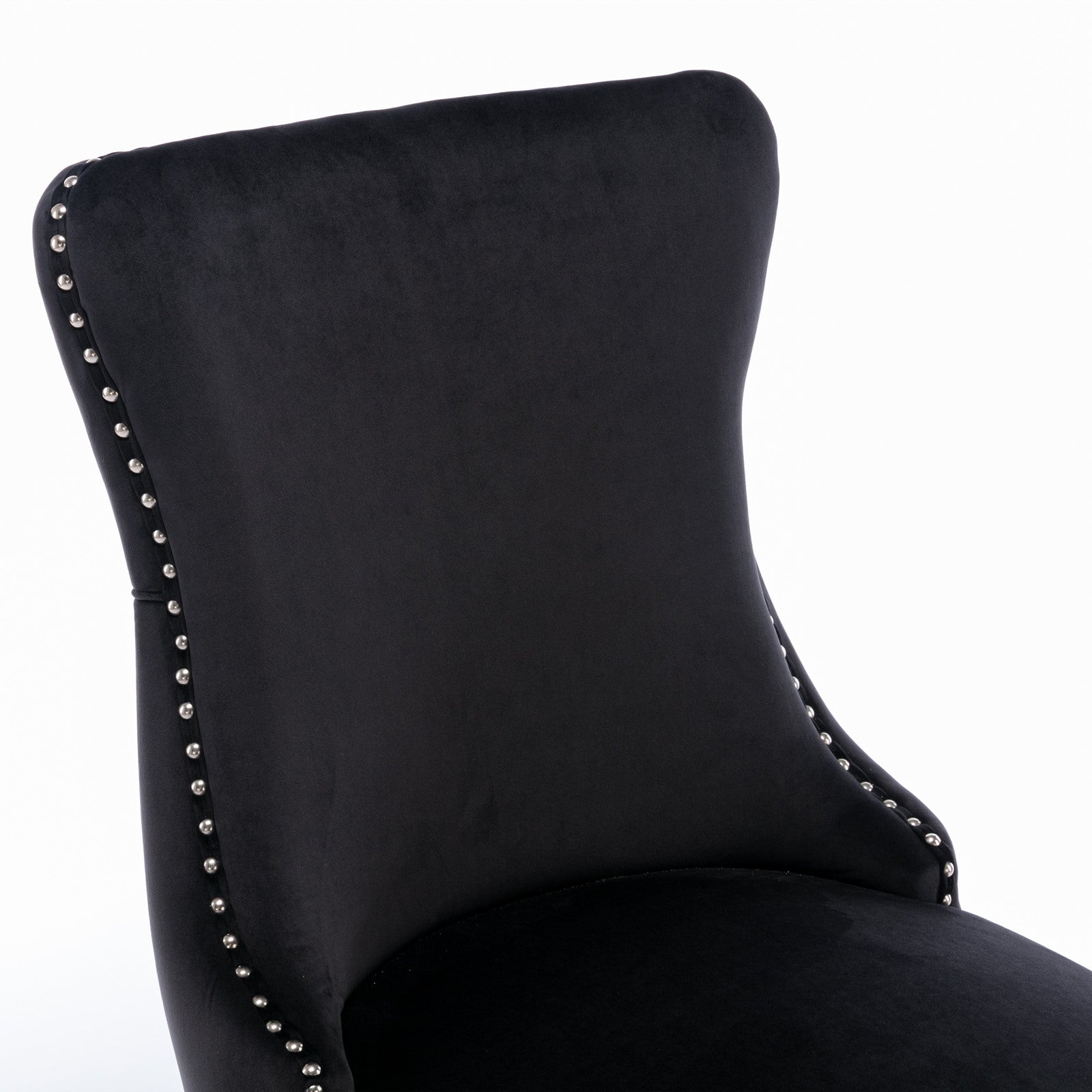 Missouri black dining chair close-up of the upholstered seat edge with decorative nailhead trim