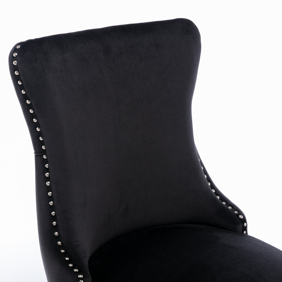 Missouri black dining chair close-up of the upholstered seat edge with decorative nailhead trim