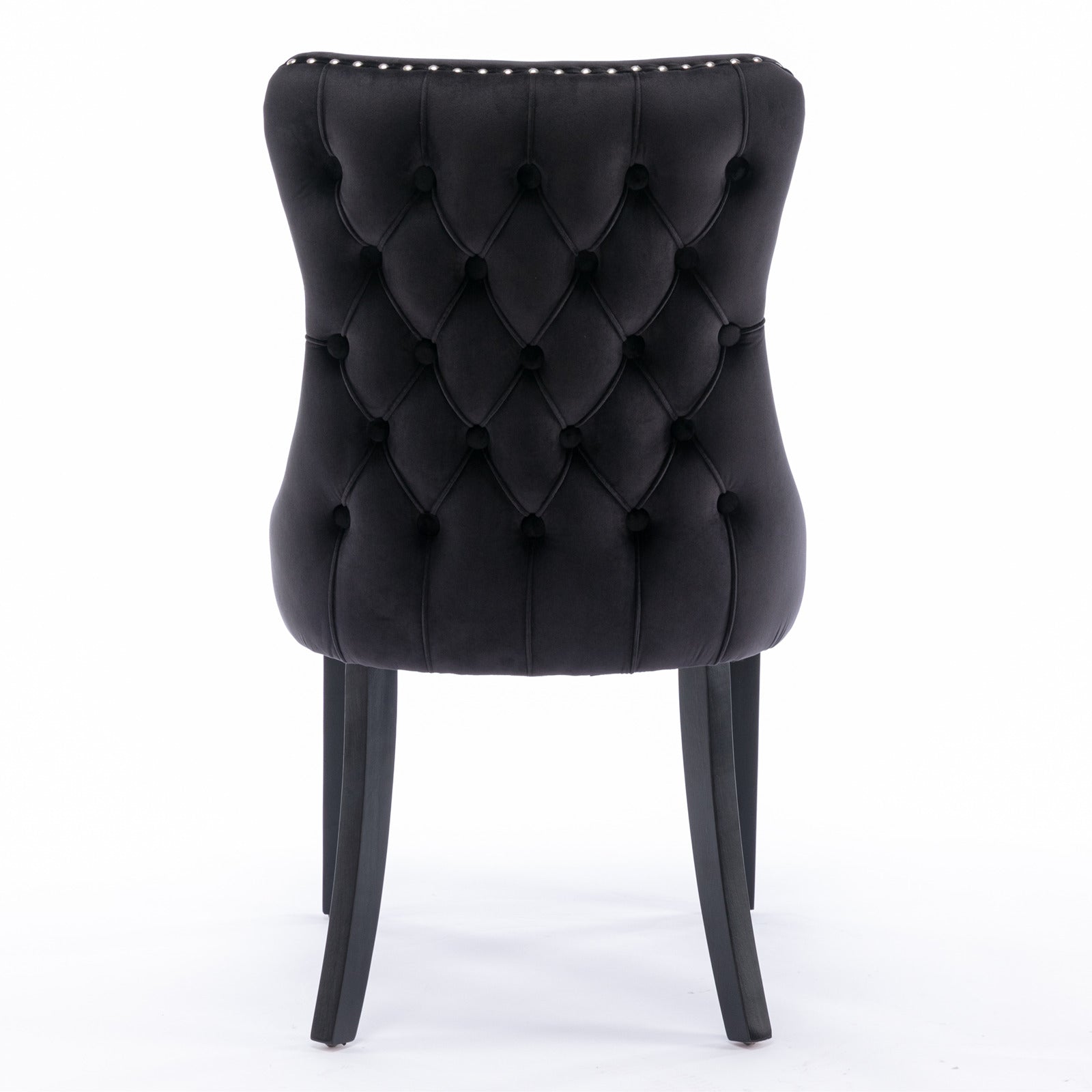 Missouri black dining chair rear angled view with curved backrest on white background
