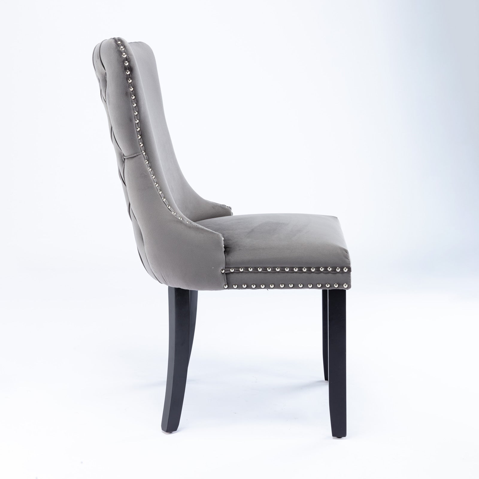Missouri gray dining chair side view with solid wood legs on white background