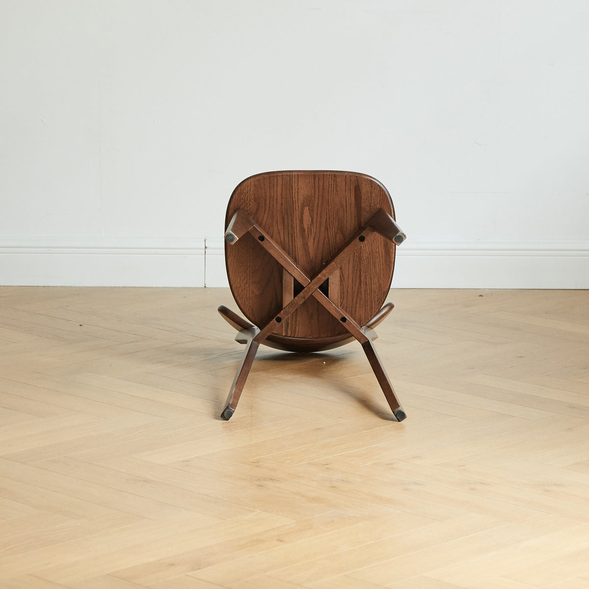 Mogan walnut solid wood dining chair underside view showing the seat and support frame construction