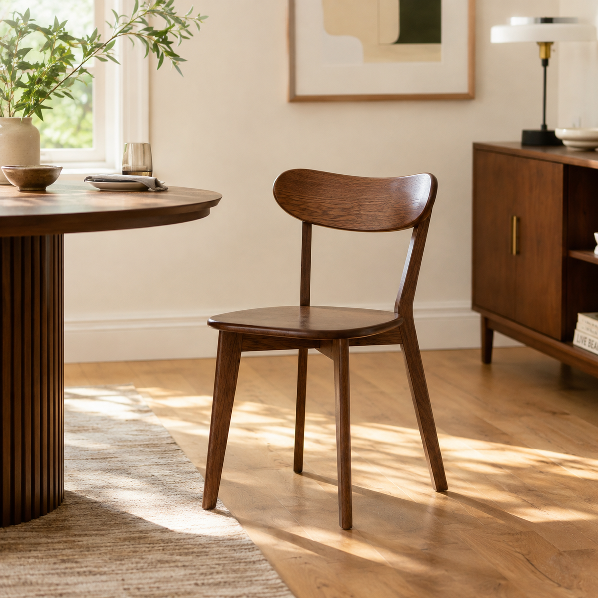 Mogan walnut solid wood dining chair in a cozy dining area with neutral decor