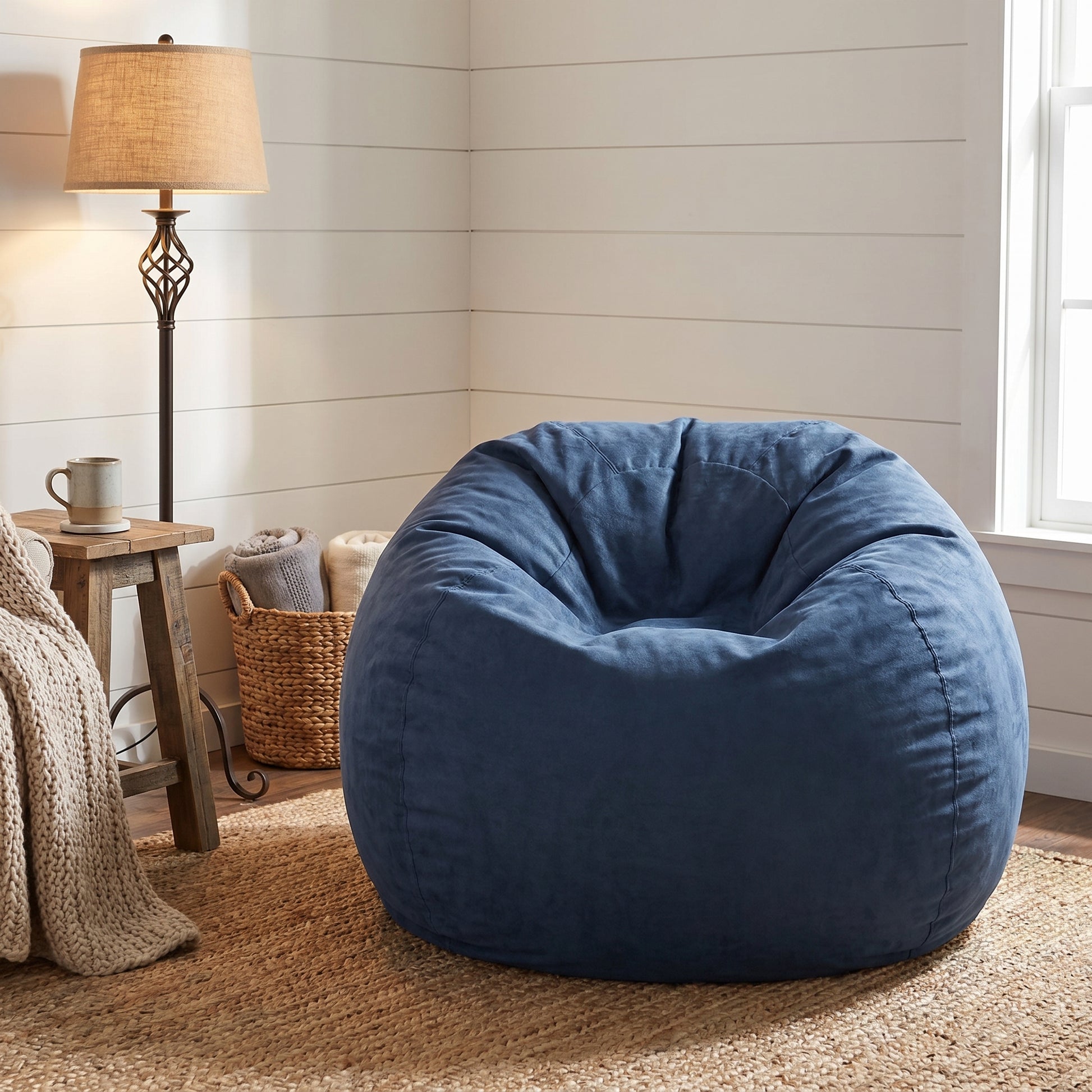 Mojave blue bean bag chair showing oversized seating in a cozy living room