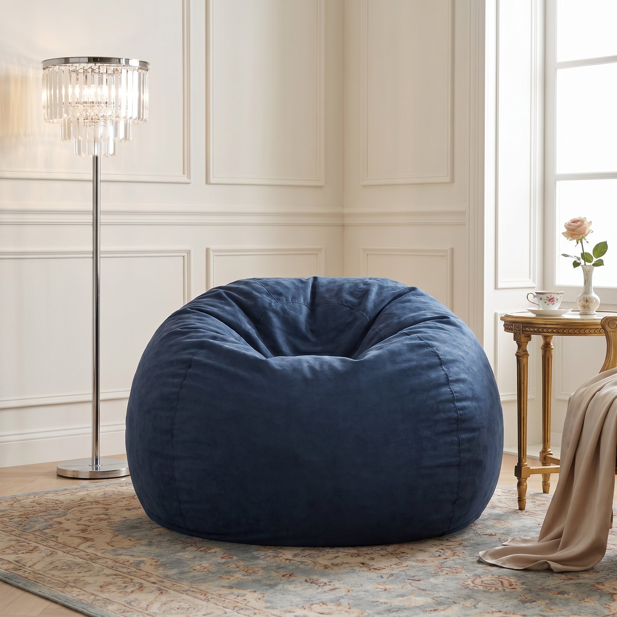 Mojave blue bean bag chair showing casual seating beside a floor lamp