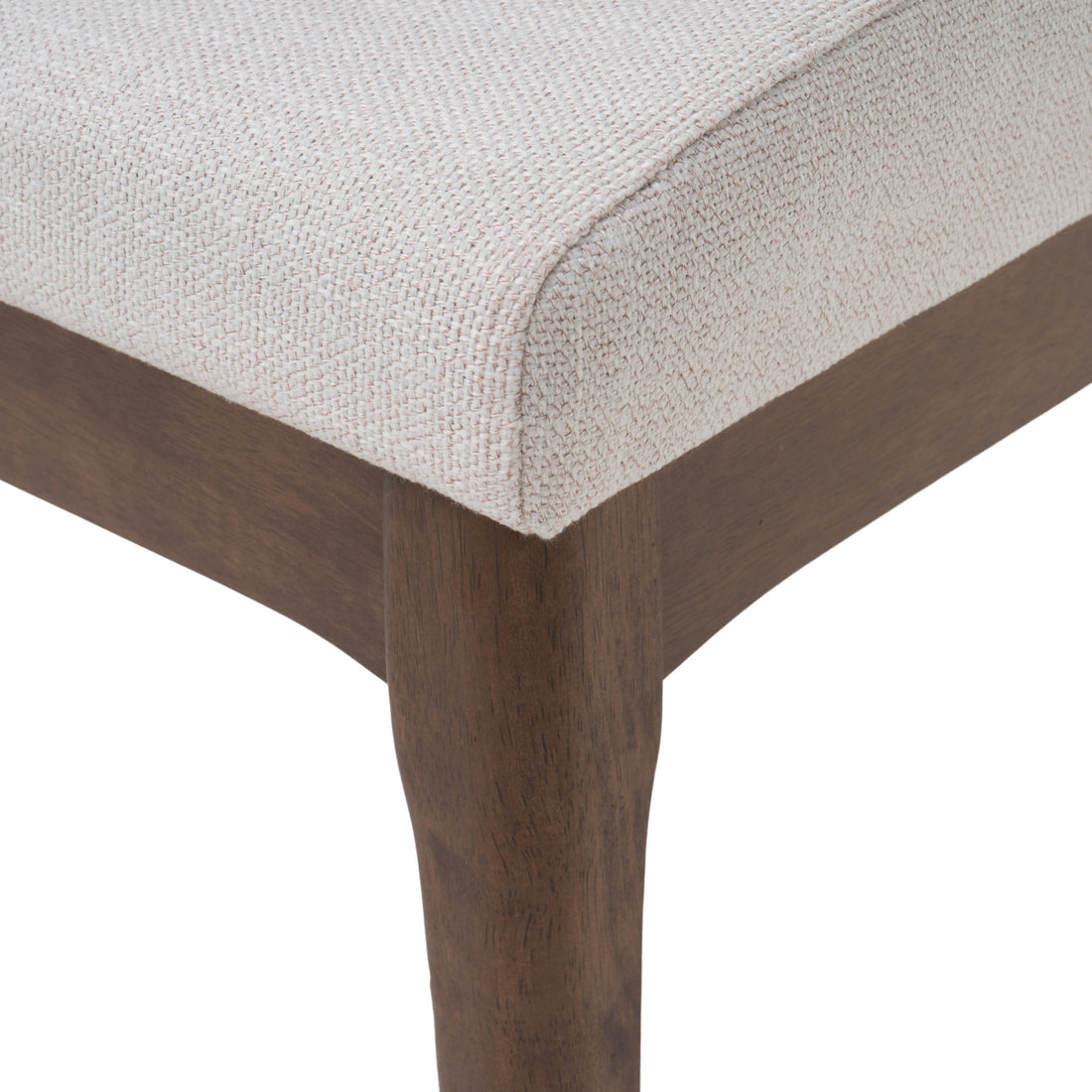 Nakuru white dining chair close-up of the seat corner and tapered rubberwood leg