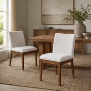 Nakuru white upholstered Parsons dining chairs with solid rubberwood legs around a wood dining table
