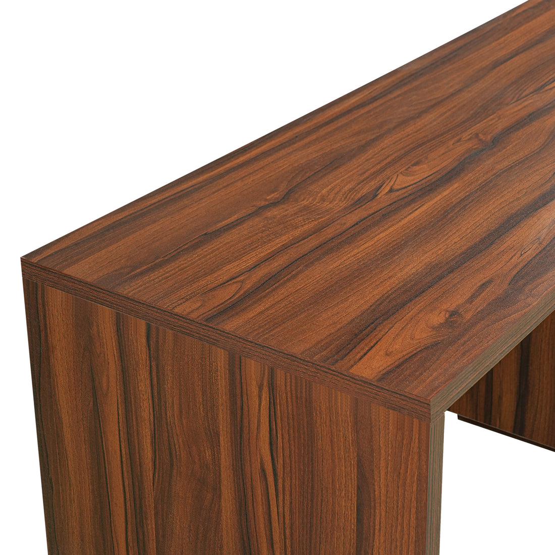 Narvik walnut executive desk showing wood grain and desktop corner detail