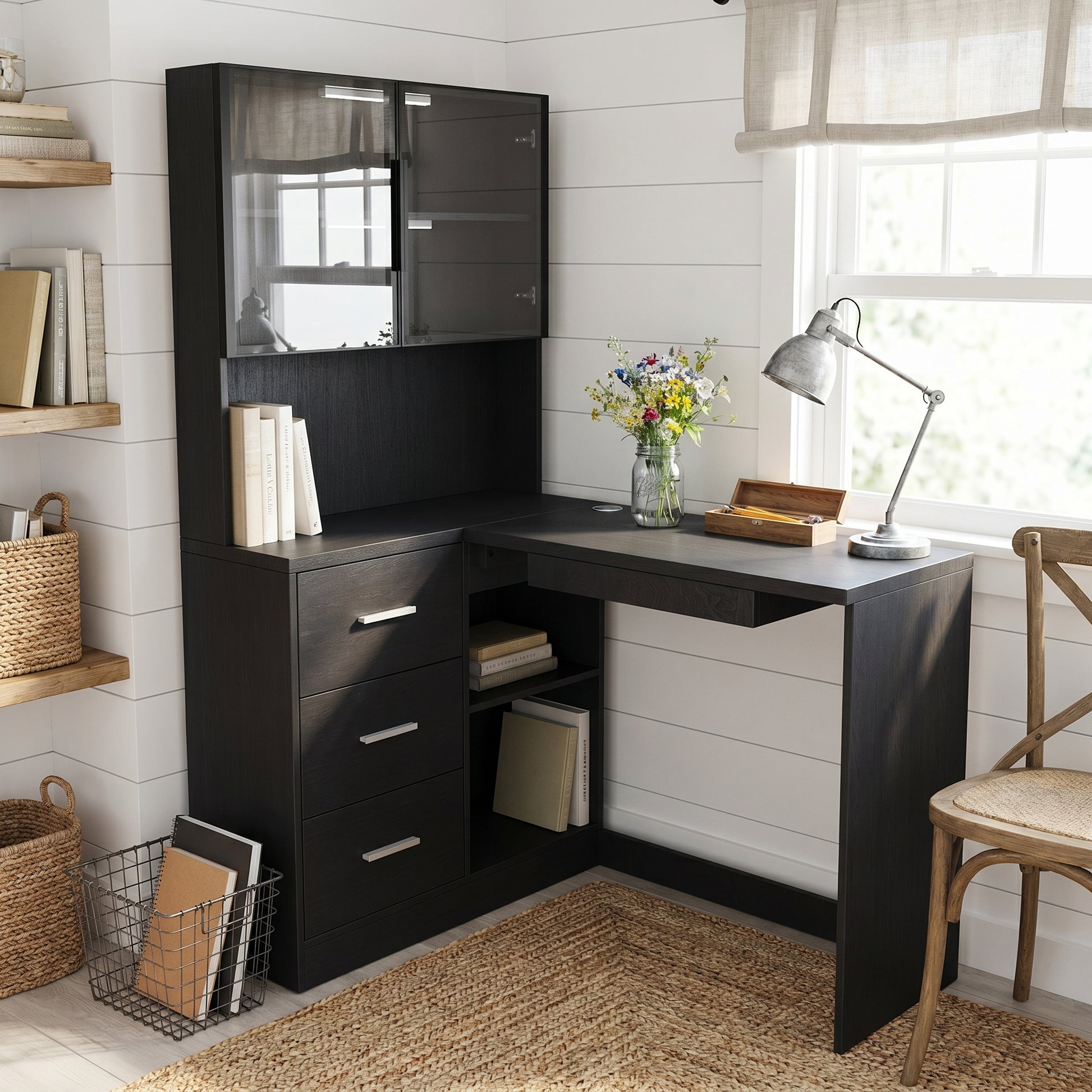 Nord black computer desk showing a corner workstation with storage cabinet and desk surface