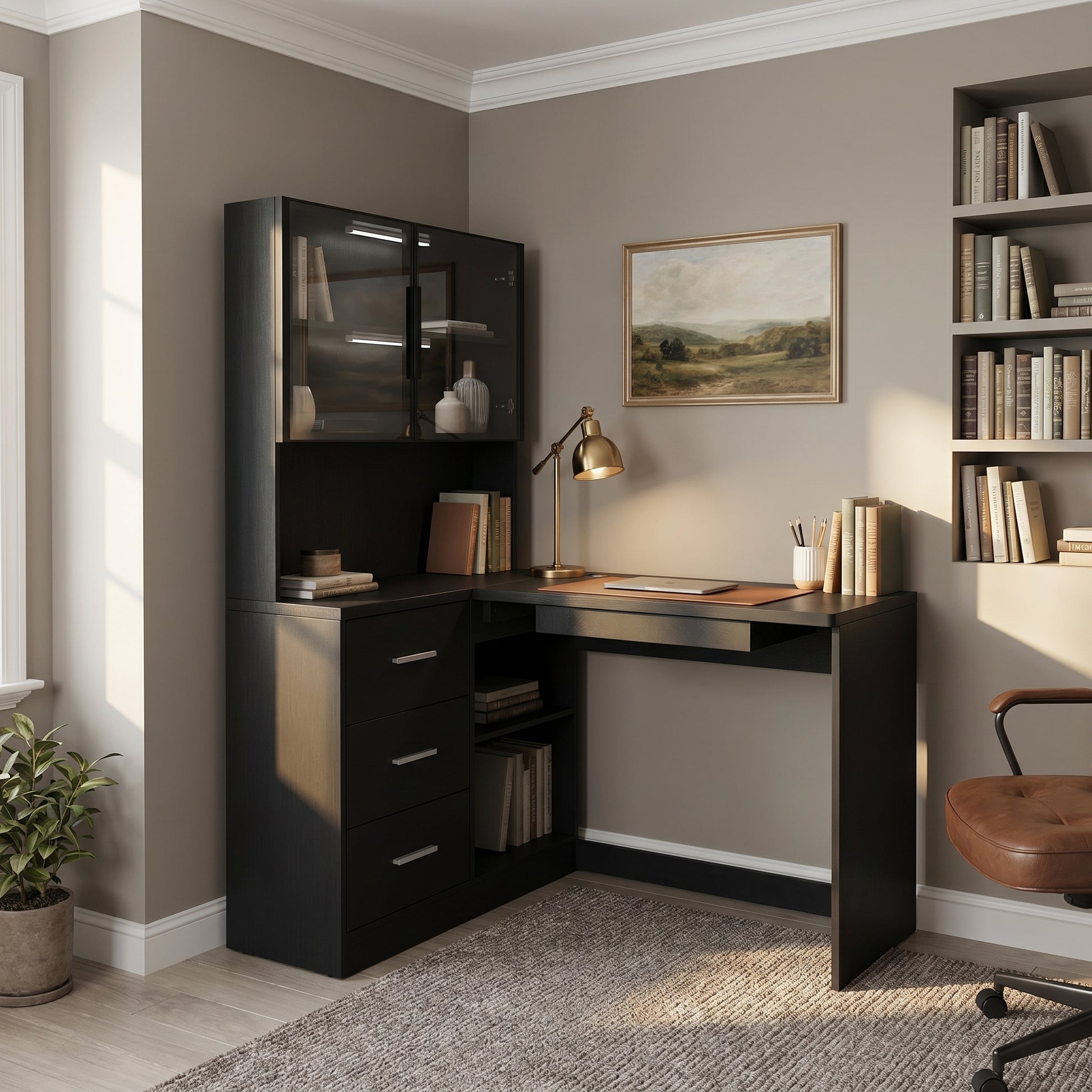 Nord black computer desk showing a compact office corner with display cabinet and writing area
