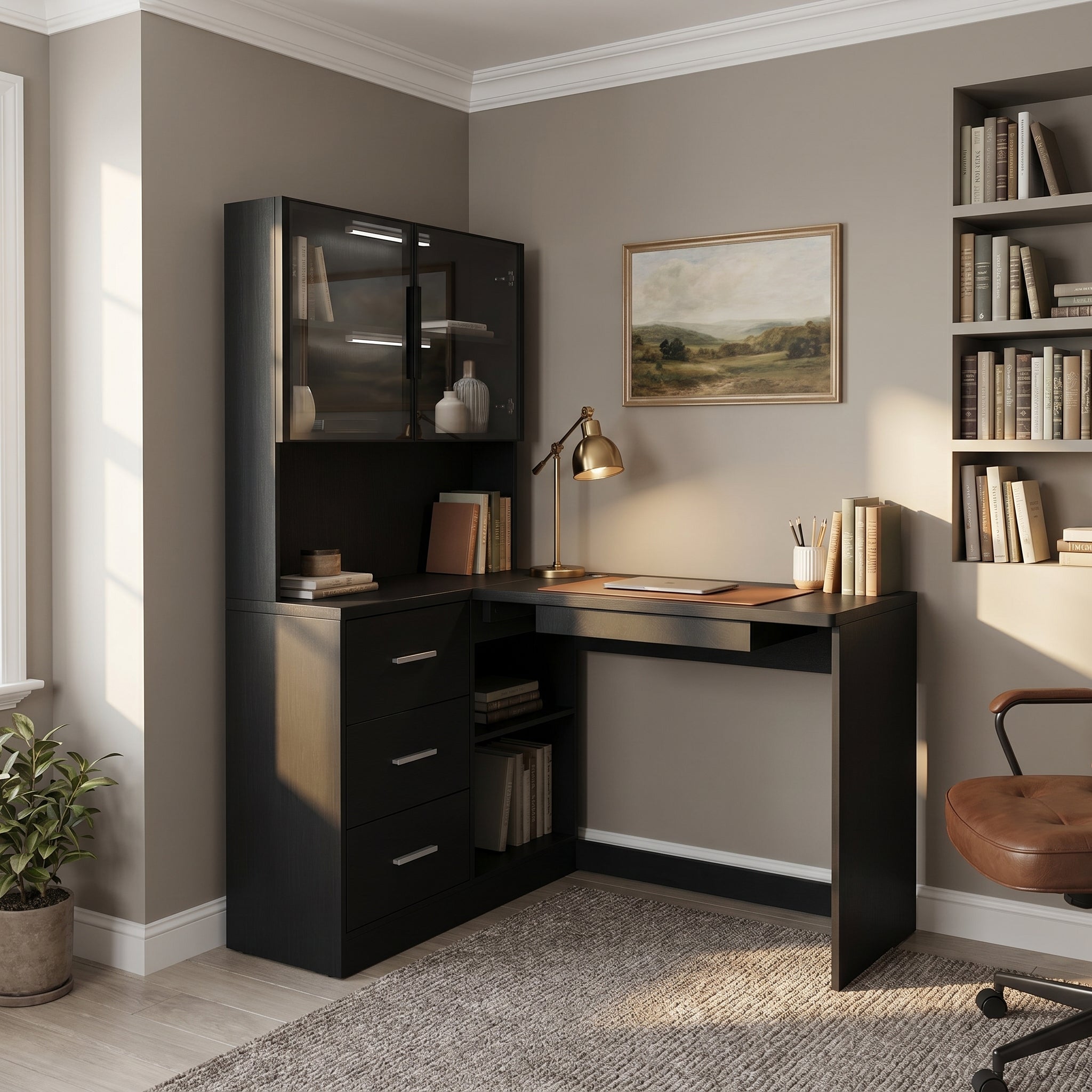 Nord black computer desk showing a compact office corner with display cabinet and writing area