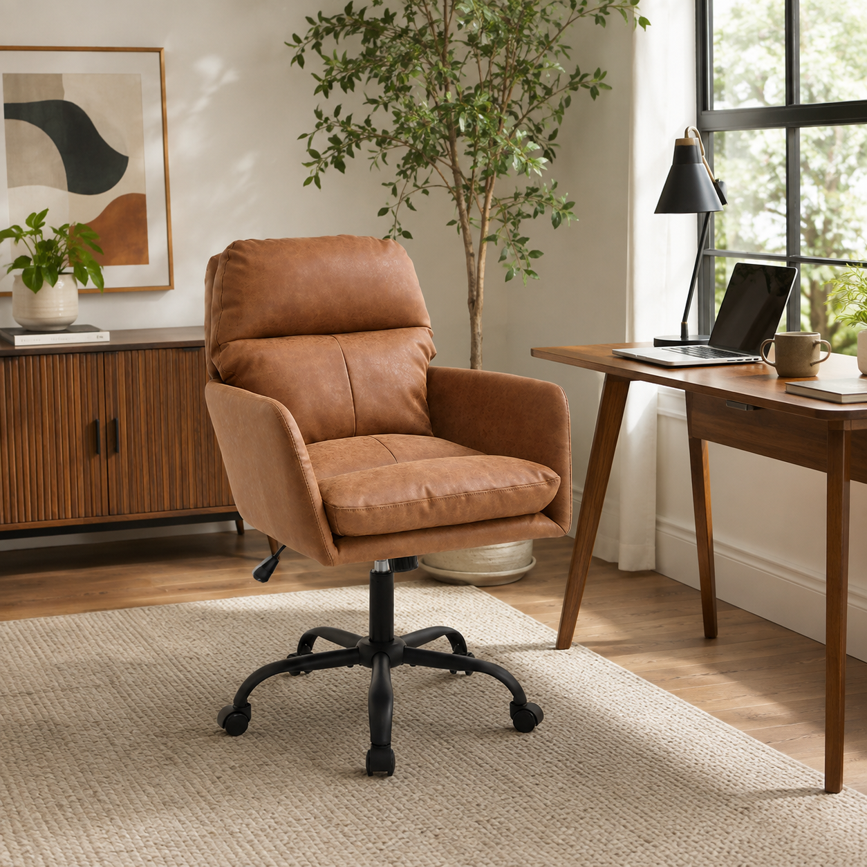 Norven brown faux leather office chair in a bright room with natural light and plants