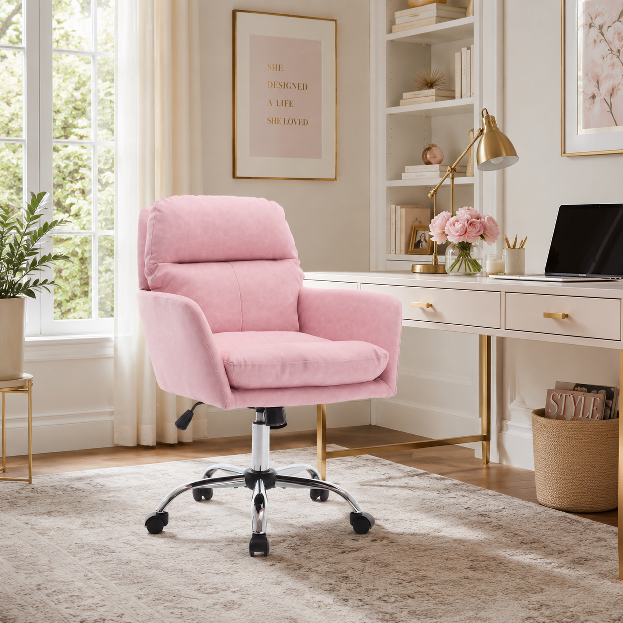 Norven pink faux leather swivel office chair in a bright home office with wood furniture