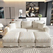 Norwalk beige sectional sofa showing lifestyle front view with modular ottoman layout
