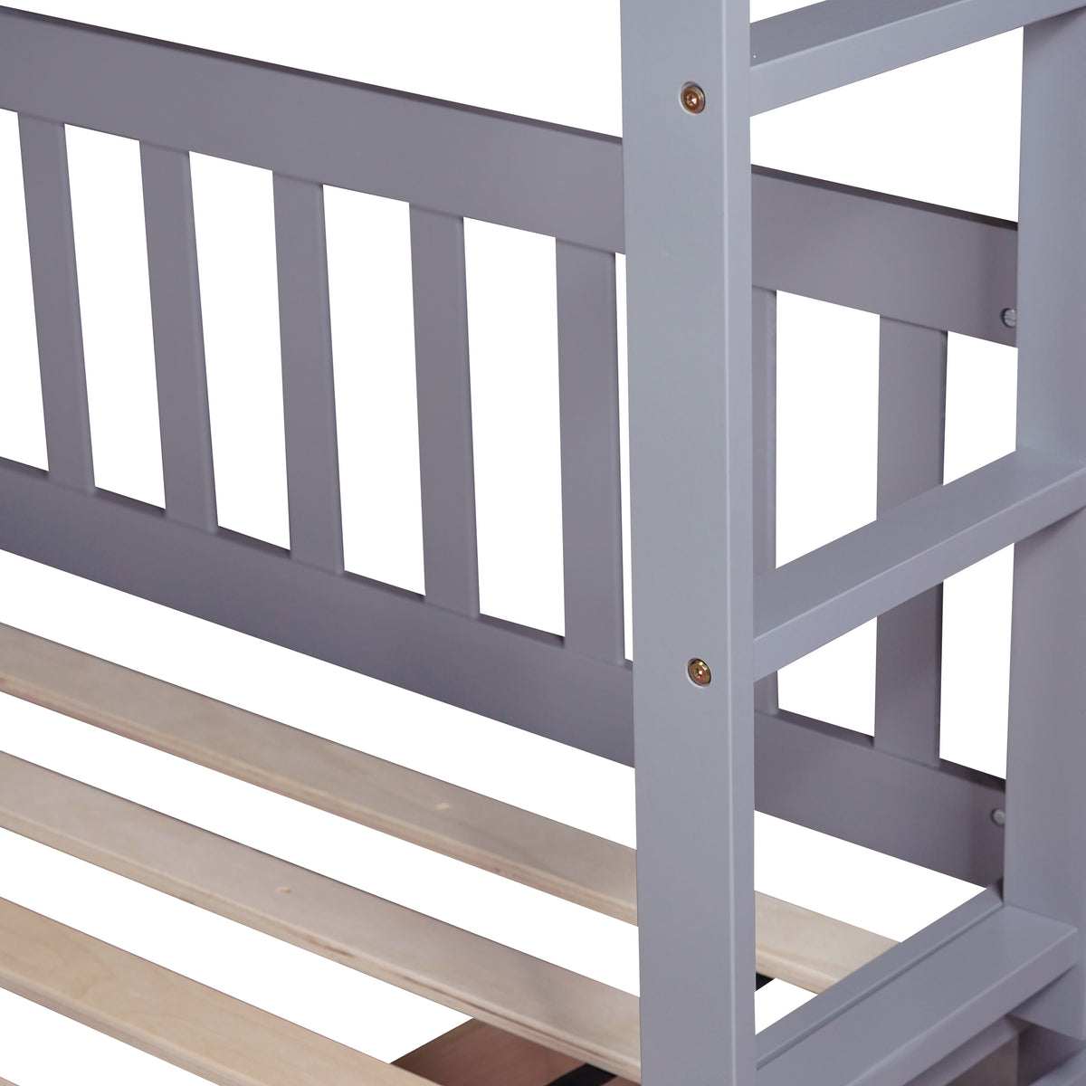 Orla gray full over full rubberwood bunk bed close-up of the lower bunk and rolling storage drawer