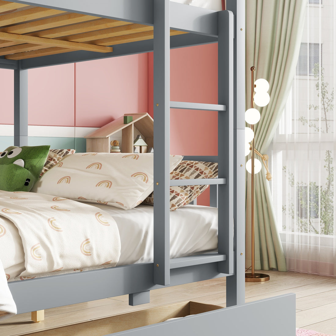 Orla gray full over full rubberwood bunk bed close-up of the front guardrail and bed frame construction