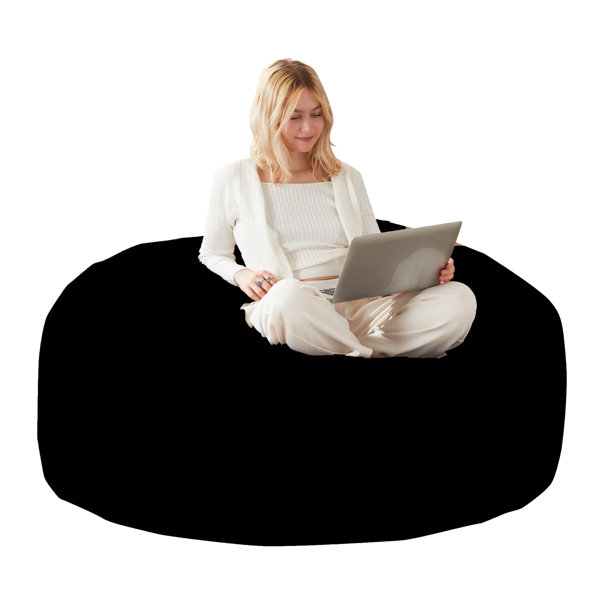 Pebble black bean bag chair showing a seated woman reading against a white background