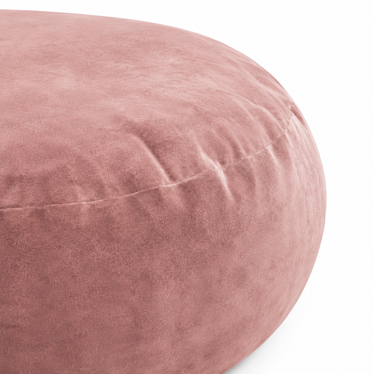 Pebble pink bean bag chair showing soft plush fabric and curved edge detail