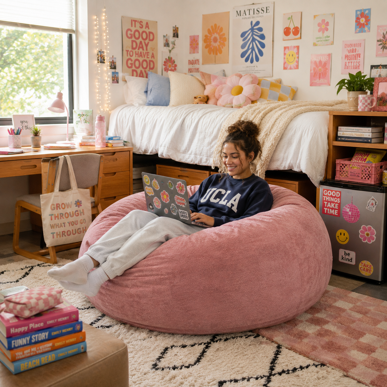 Pebble pink bean bag chair showing a child relaxing in a colorful bedroom and play space