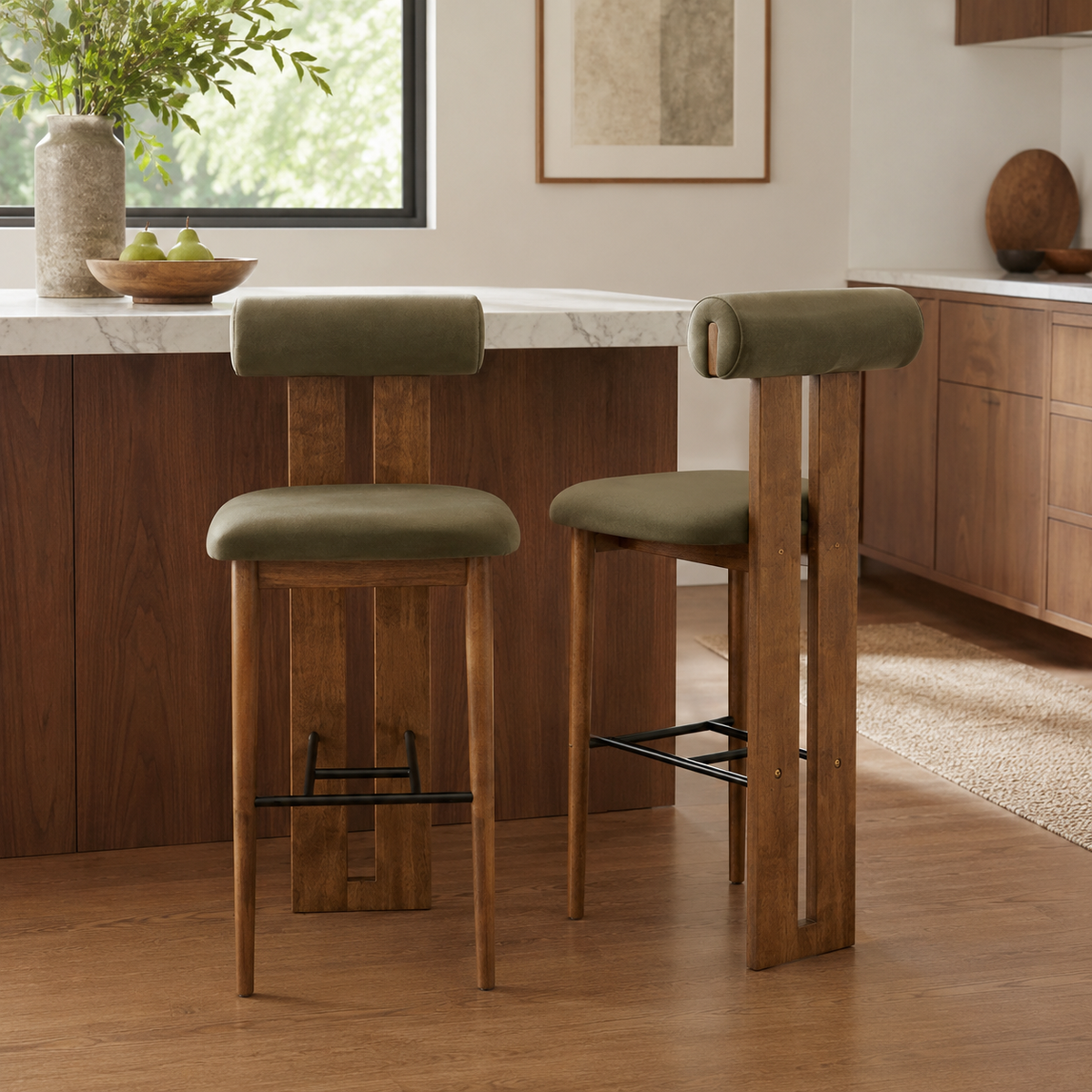 Pienza green upholstered bar stools in a kitchen island setting