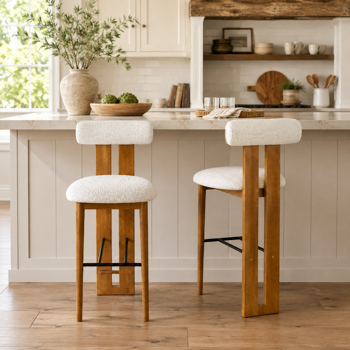 Pienza ivory upholstered bar stools beside a home bar counter