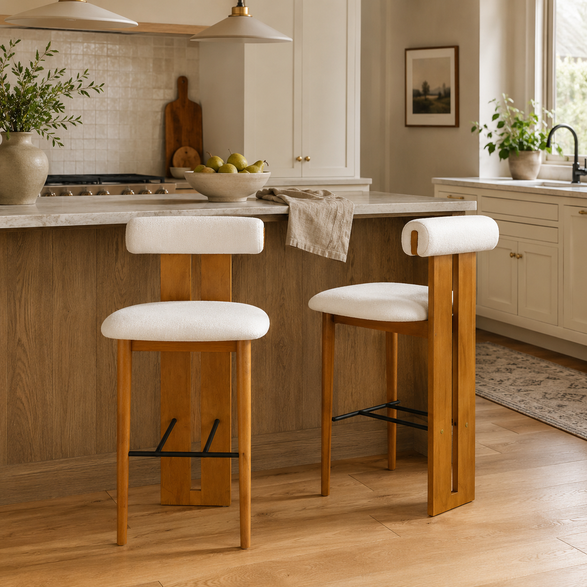 Pienza white upholstered bar stools beside a kitchen counter