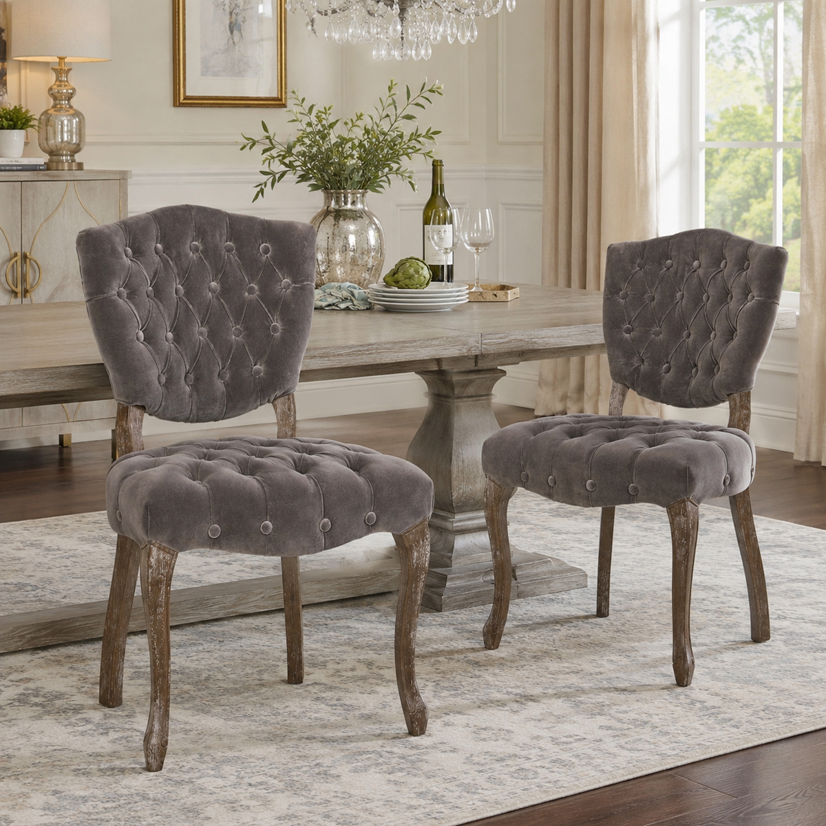 Prespa charcoal dining chair showing two chairs beside a round dining table