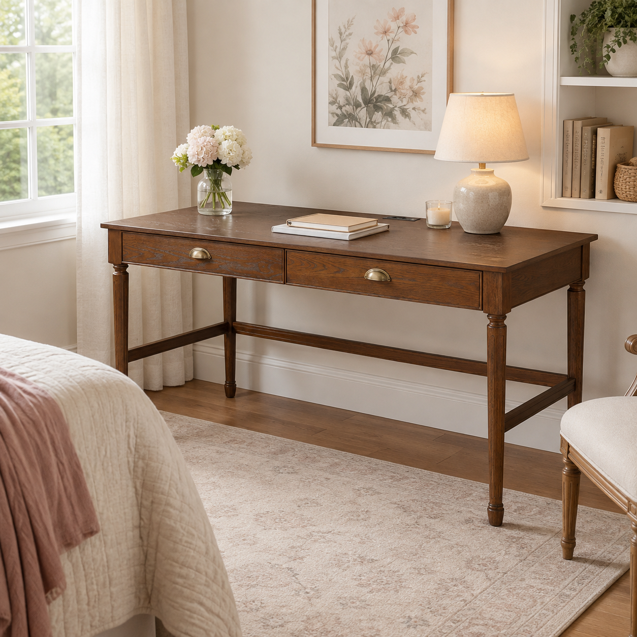 Pulse walnut writing desk showing two drawers in a warm bedroom workspace beside a large window