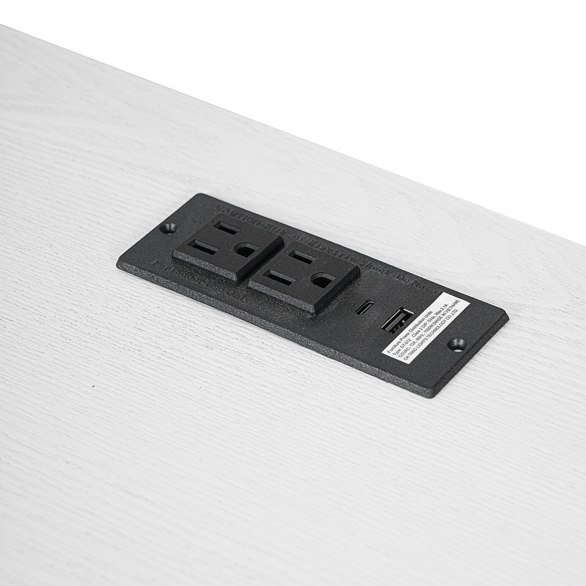 Pulse white writing desk showing built-in outlet detail