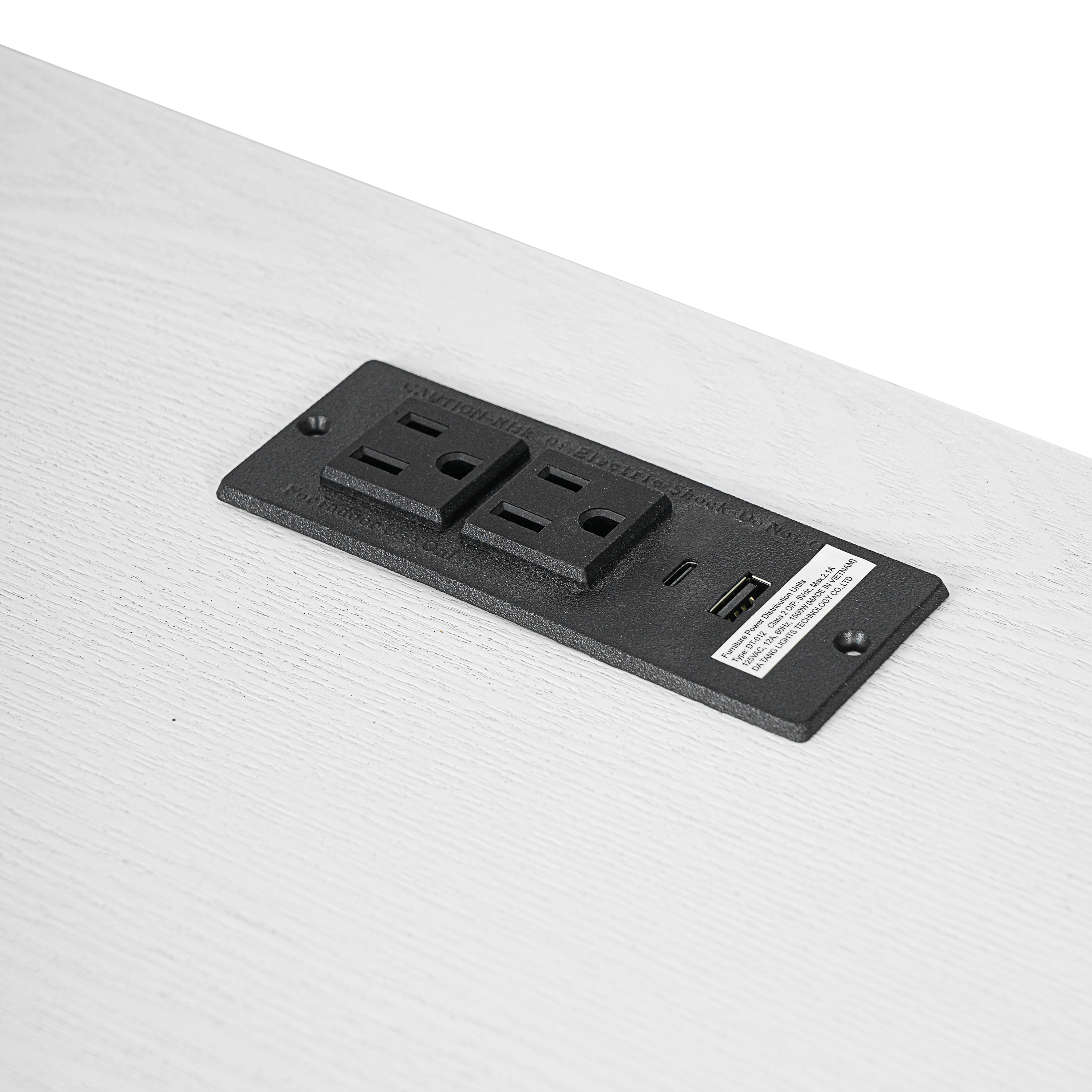 Pulse white writing desk showing built-in outlet detail