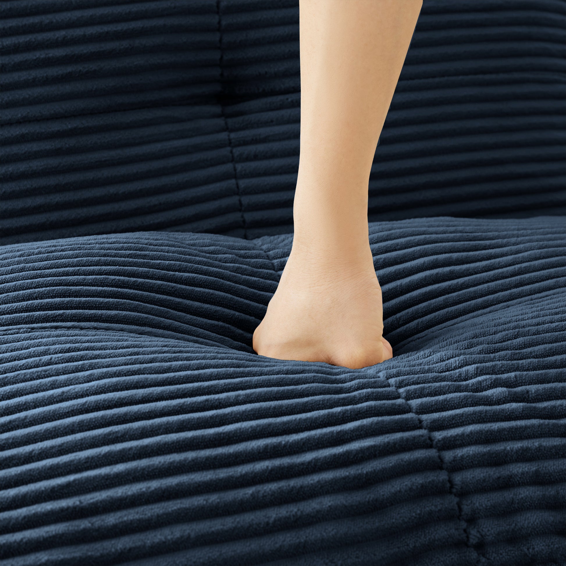 Racine blue loveseat sofa showing high resilience seat cushion compression detail