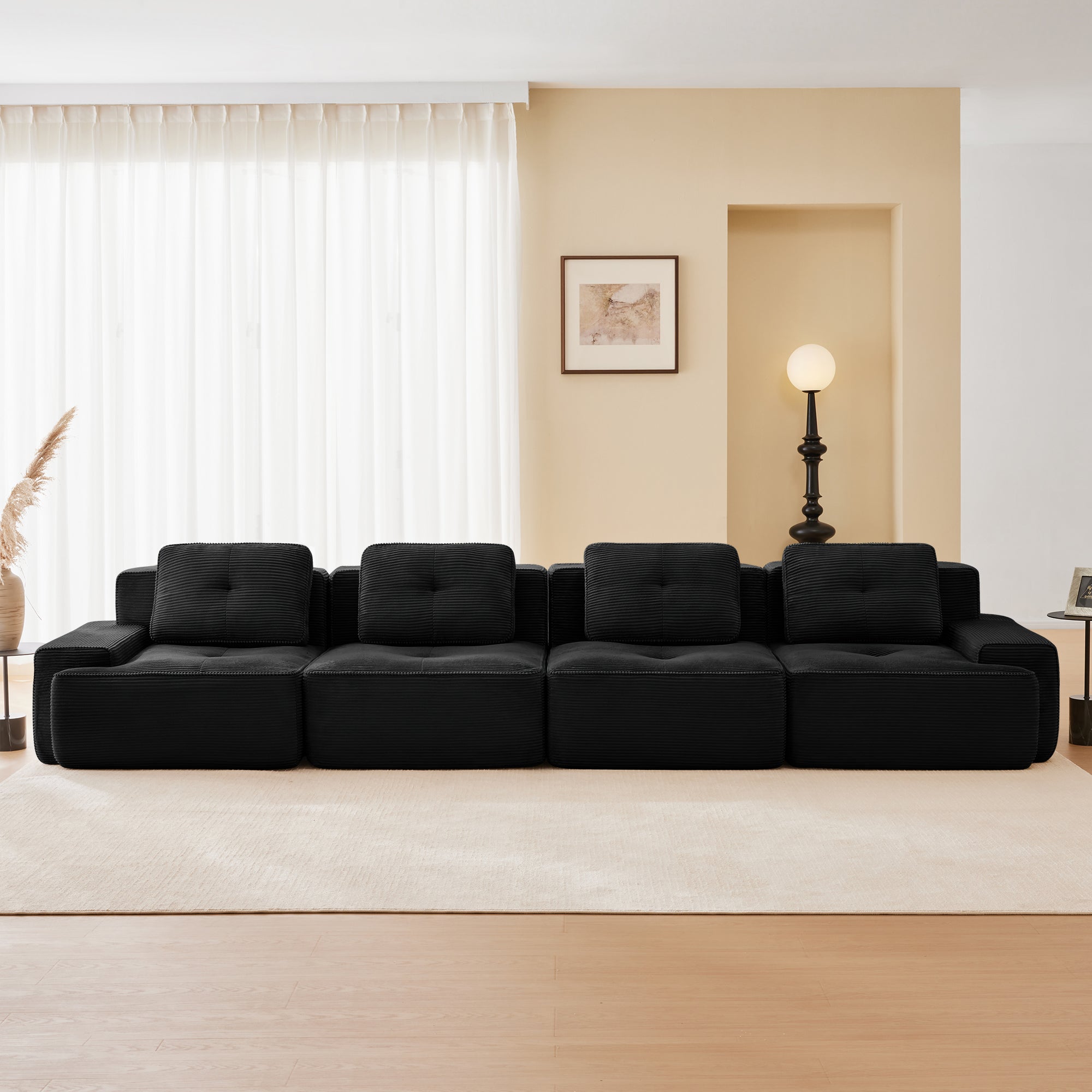 Racine black modular sofa showing front living room setup with four seats