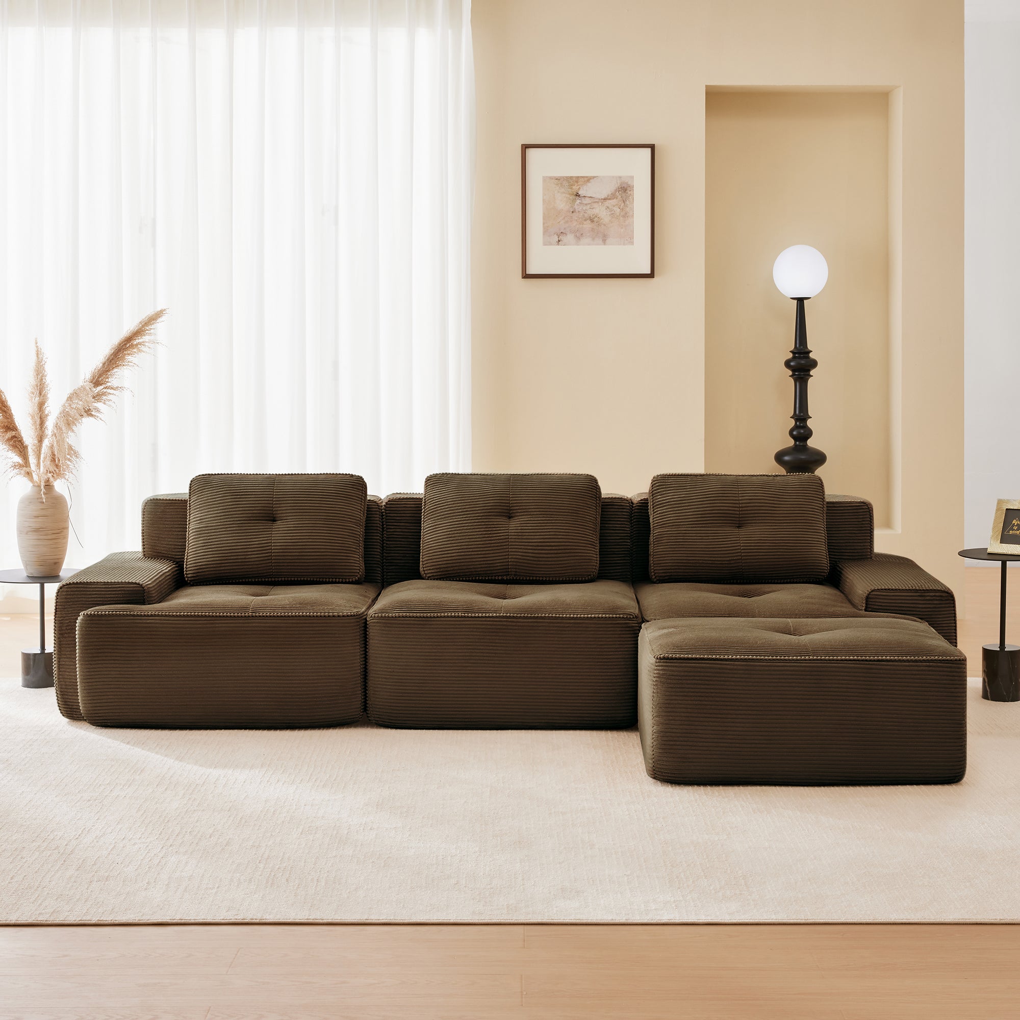 Racine brown modular sofa showing cozy living room setup with movable ottoman