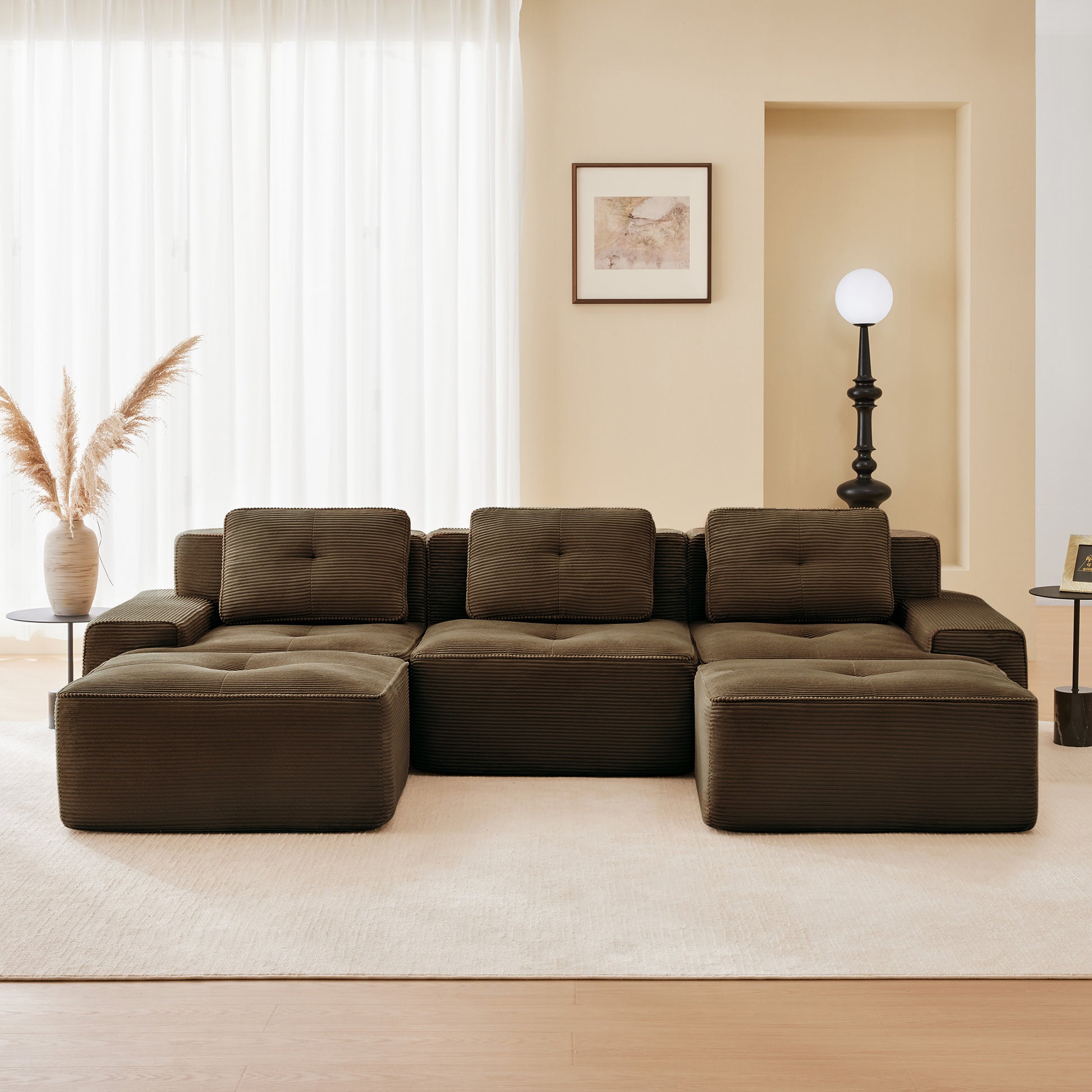 Racine brown modular sofa showing cozy living room setup with movable ottoman