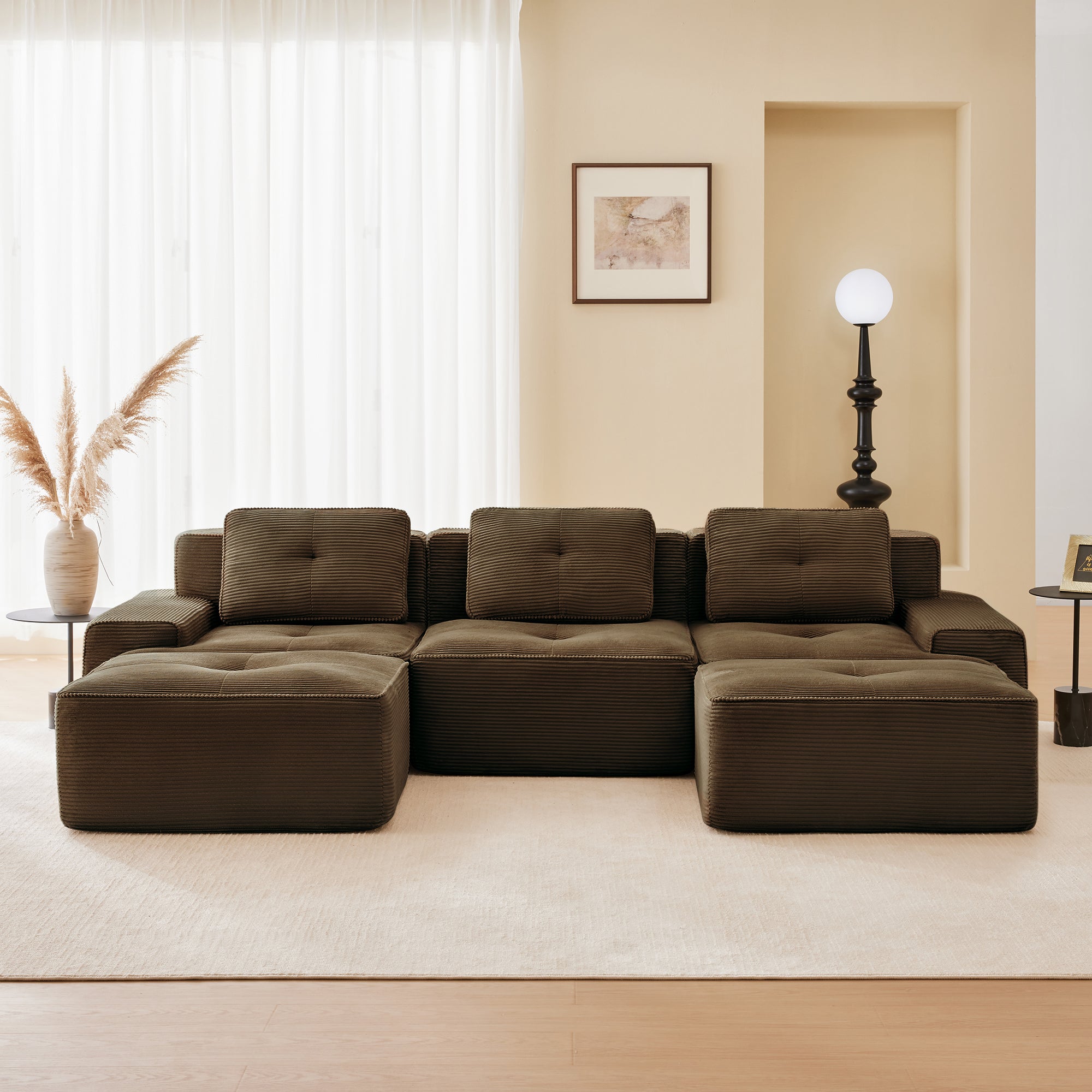 Racine brown modular sofa showing cozy living room setup with movable ottoman